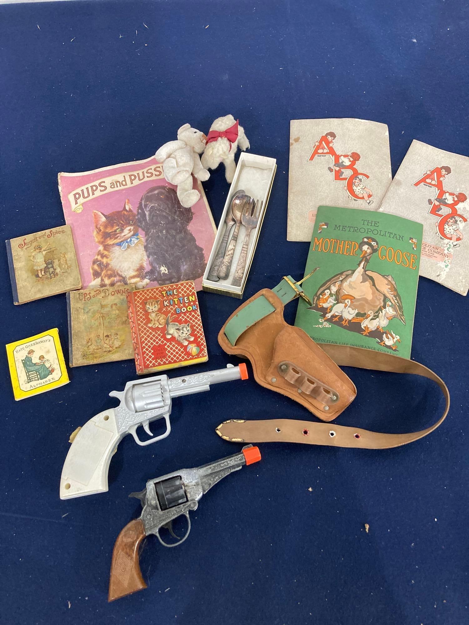 CHILDS TOY CAP GUNS, STORY BOOKS AND STUFFED ANIMALS: CHILDS SILVERWARE SET BY THE CAMPBELLS SOUP COMPANY.