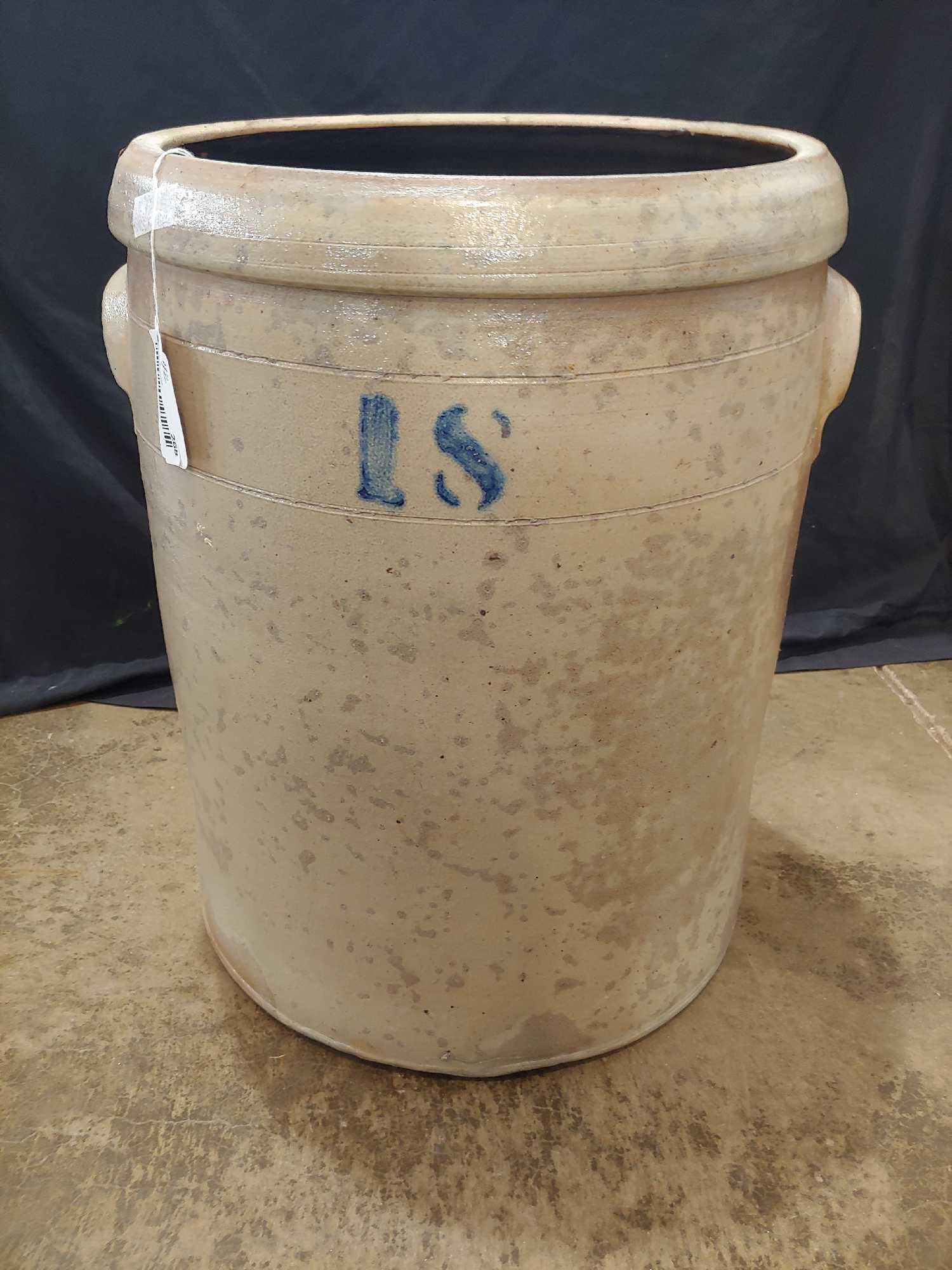 18 GALLON STONEWARE CROCK: SHOWS SOME DISCOLORATION AND SPOTTING BUT IS SOLID. NO MAJOR CHIPS OR CRACKS WERE FOUND.