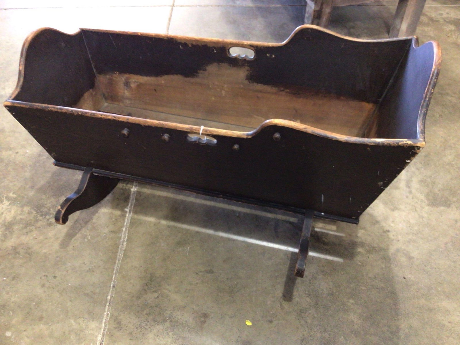 DOVETAILED ROCKING CRADLE: ORIGINAL BROWN PAINT AND SQUARE NAILED. 39X26X23 IN