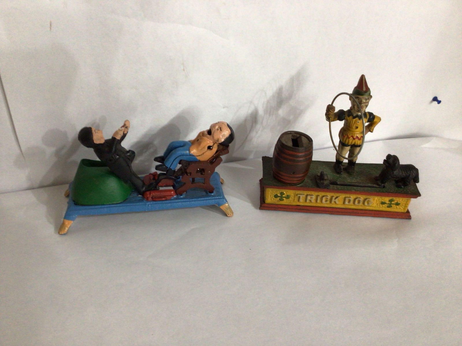 CAST IRON CLOWN AND DENTIST BANKS (1 of 4)