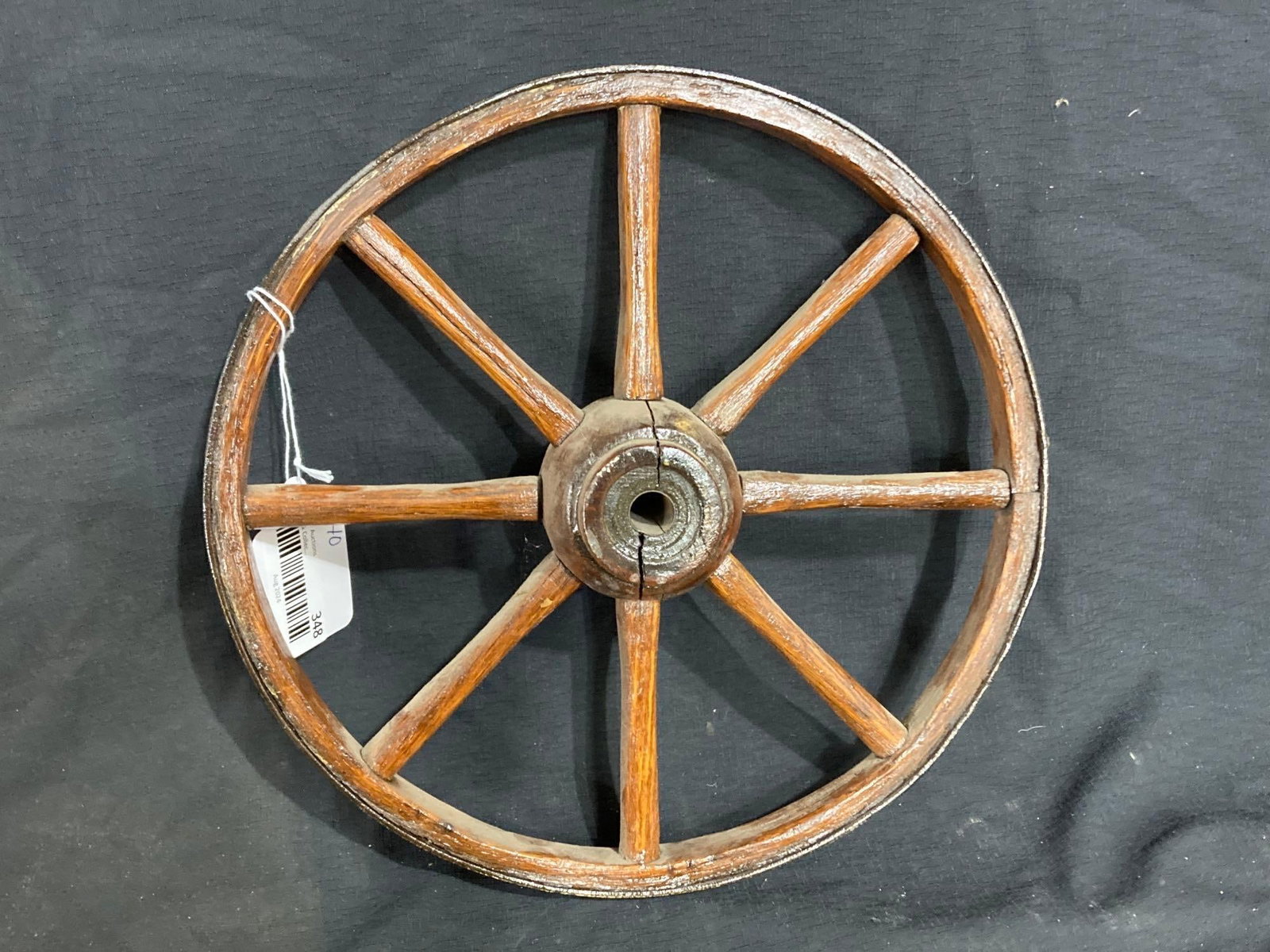 WOODEN SPOKED WHEEL: 12 IN DIAMETER