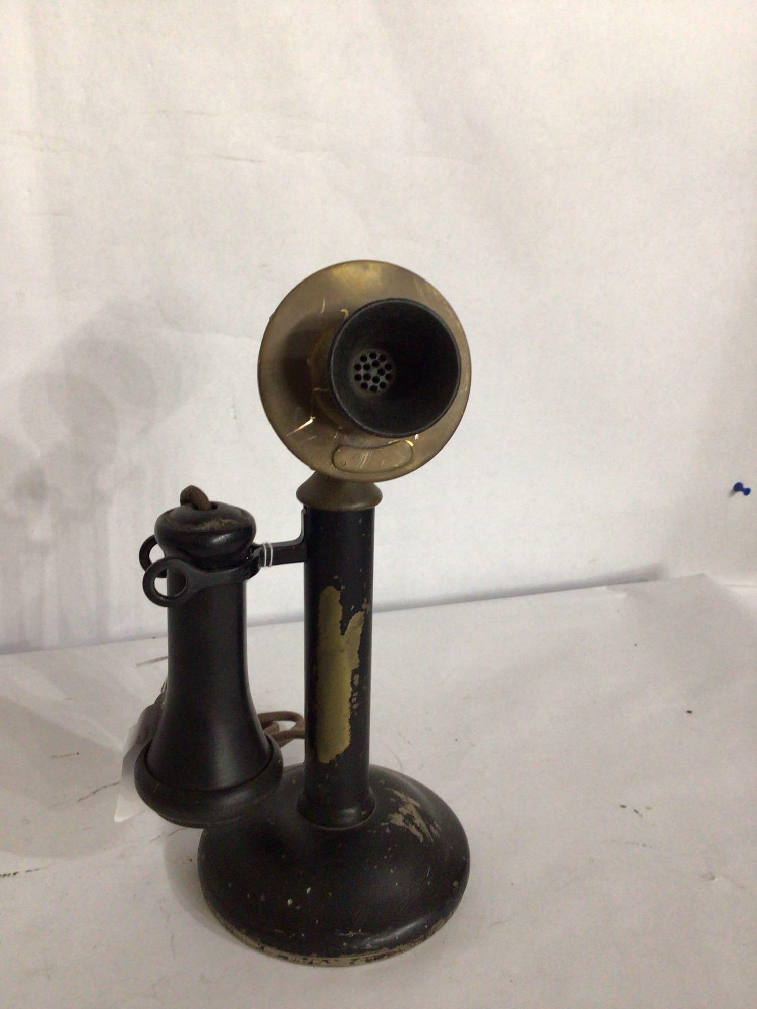 1900S CANDLESTICK PHONE: BODY SHOWS SOME SCRATCHES AND WEAR. BRASS DETAIL 12 INCHES TALL