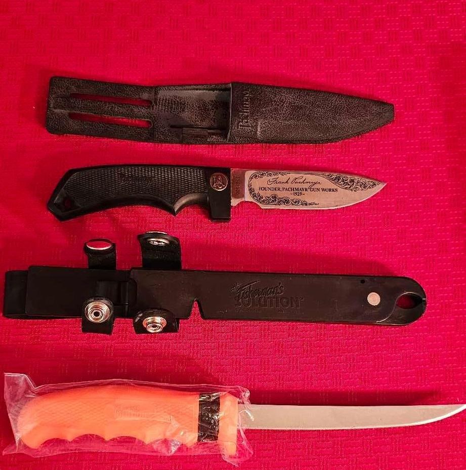FISHERMANS AND BOOT KNIFE PAIR: BOTH ARE LIKE NEW. BOOT KNIFE 13 OF 100 FOUNDER PACHMAYR GUN WORKS WITH BOOT SHEATH.