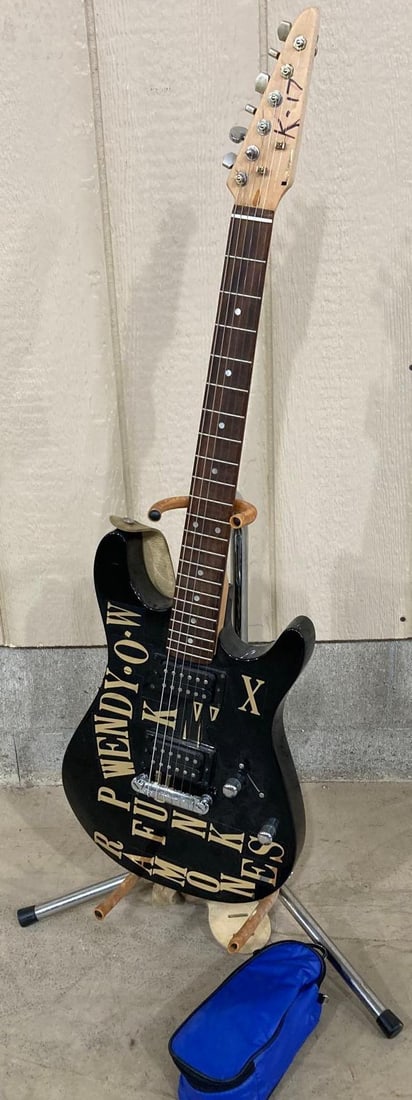 VINTAGE ELECTRIC GUITAR: NO BRAND, HAS BEEN PERSONALLY DECORATED, INCLUDES LEATHER STRAP AND STAND, INCLUDES CORDS