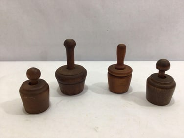 FOUR MINIATURE WOODEN BUTTER MOLDS