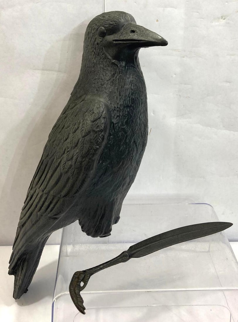 ITALIAN COMPOSITE RAVEN DECOY AND CLAW LETTER OPENER: DECOY IS 17 IN LONG, AND CAST IRON LETTER OPENER IS 10 INCHES