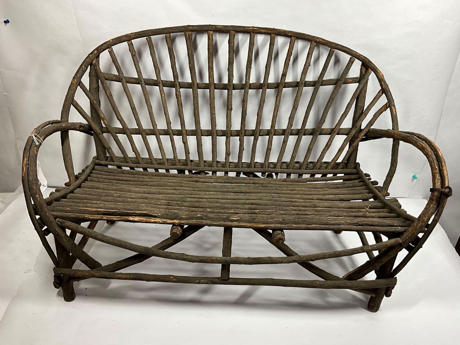 CHILDS HICKORY LOVESEAT: BENT WOOD ARMS AND BACK. A GREAT PRIMITIVE PIECE. 32 INCHES LONG X 20.5