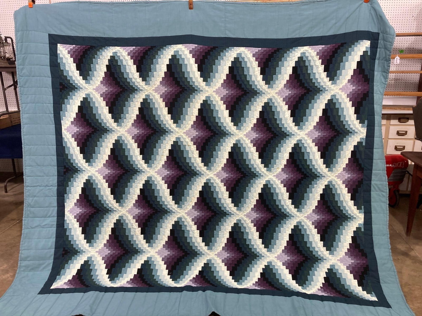BARGELLO SHADOW HAND STITCHED QUILT: SOME DISCOLORATION AND MINOR STAINS THROUGHOUT 96X105