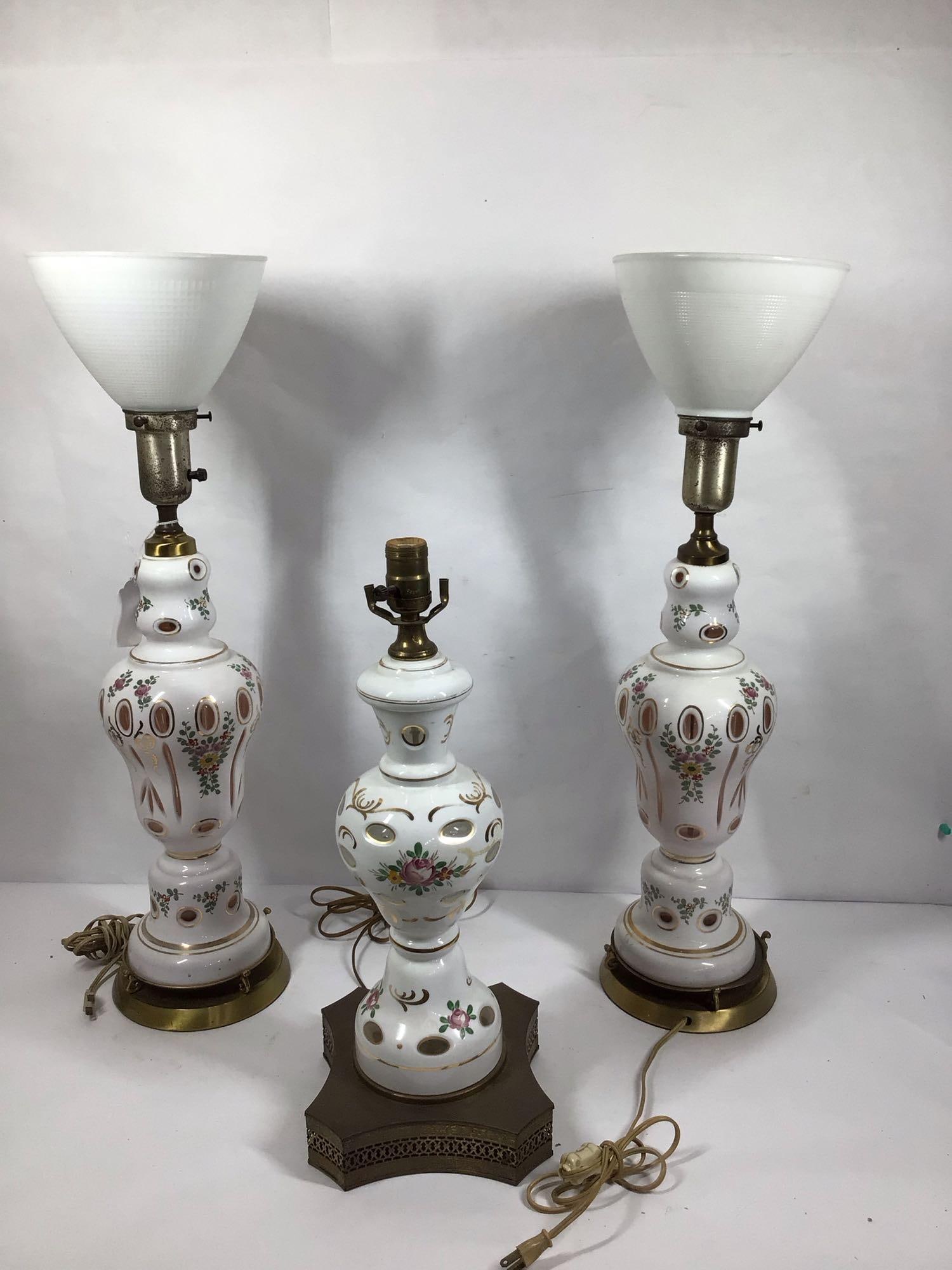 SET OF 3 BOHEMIAN GLASS LAMPS: TWO ARE MATCHING WITH MILK GLASS SHADES 23 IN TALL. ONE IS MISSING A SHADE AND IS 21 IN TALL