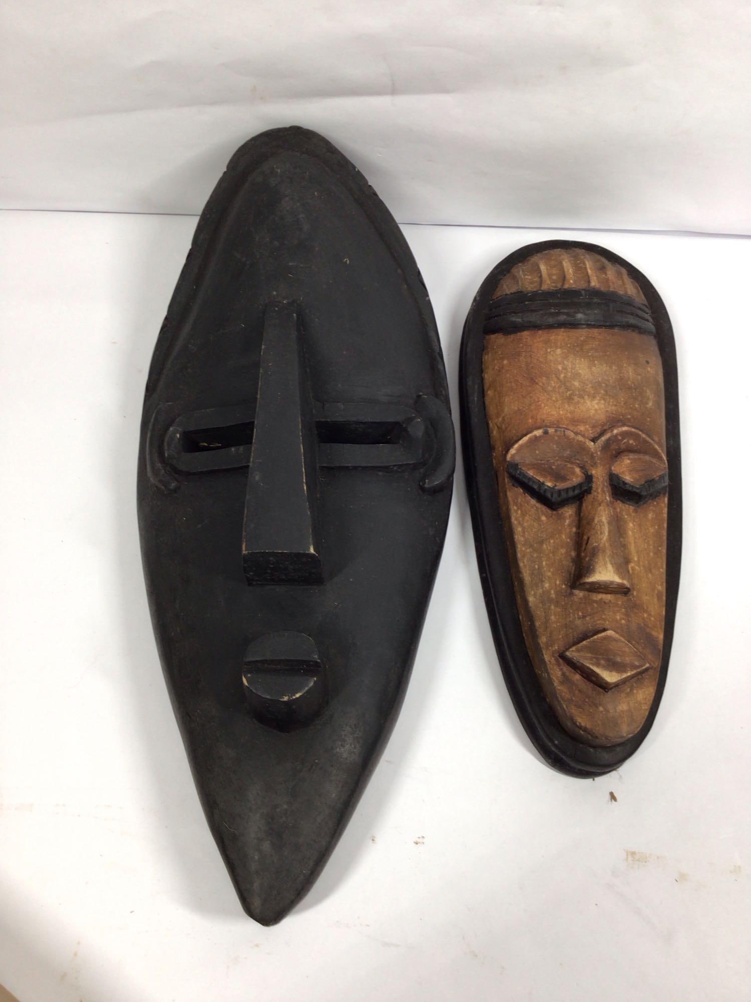 2-Wooden hand carved African masks (1 of 4)