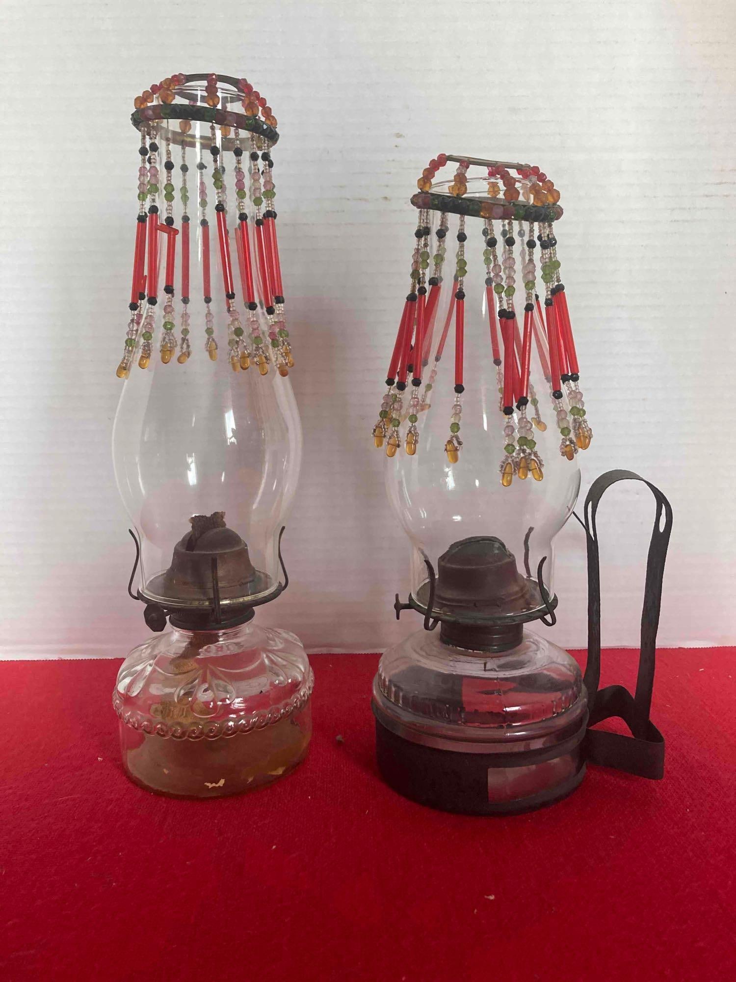 PAIR OF EARLY OIL LAMPS: EACH DECORATED WITH BEADED SHADES