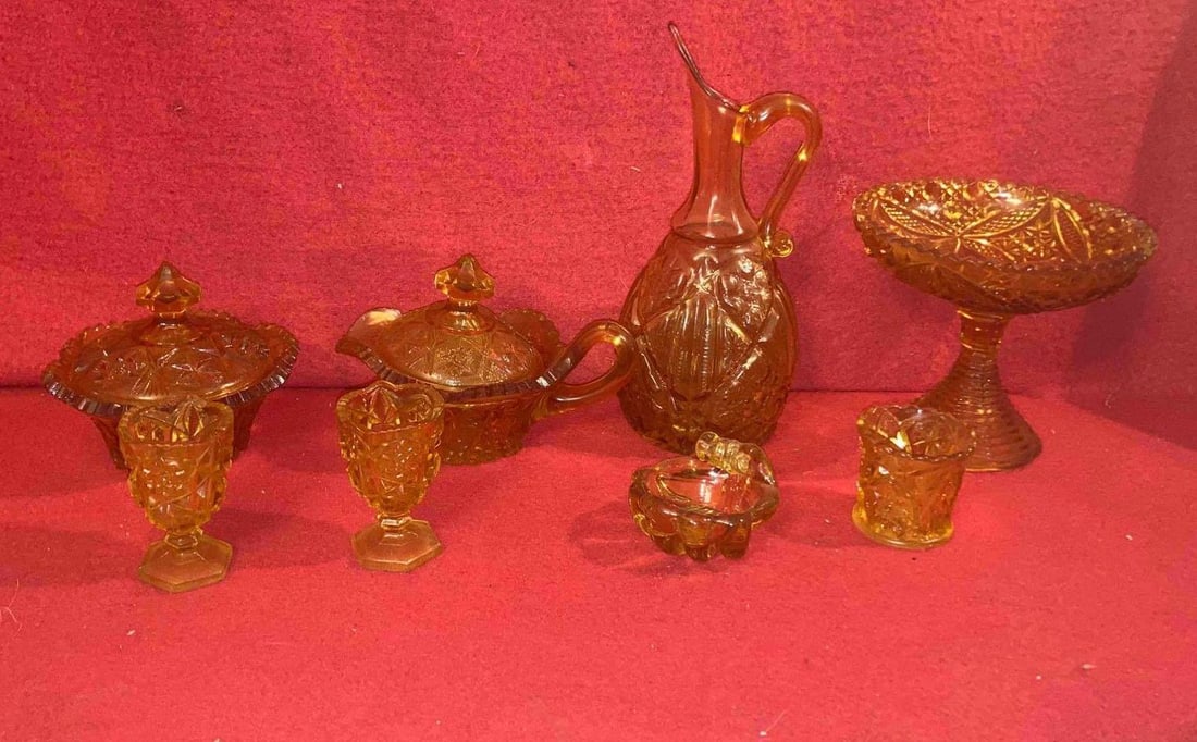 AMBER GLASSWARE: INCLUDES A CREAM AND SUGAR SET SEVERAL SHOT GLASSES PITCHER AND MORE