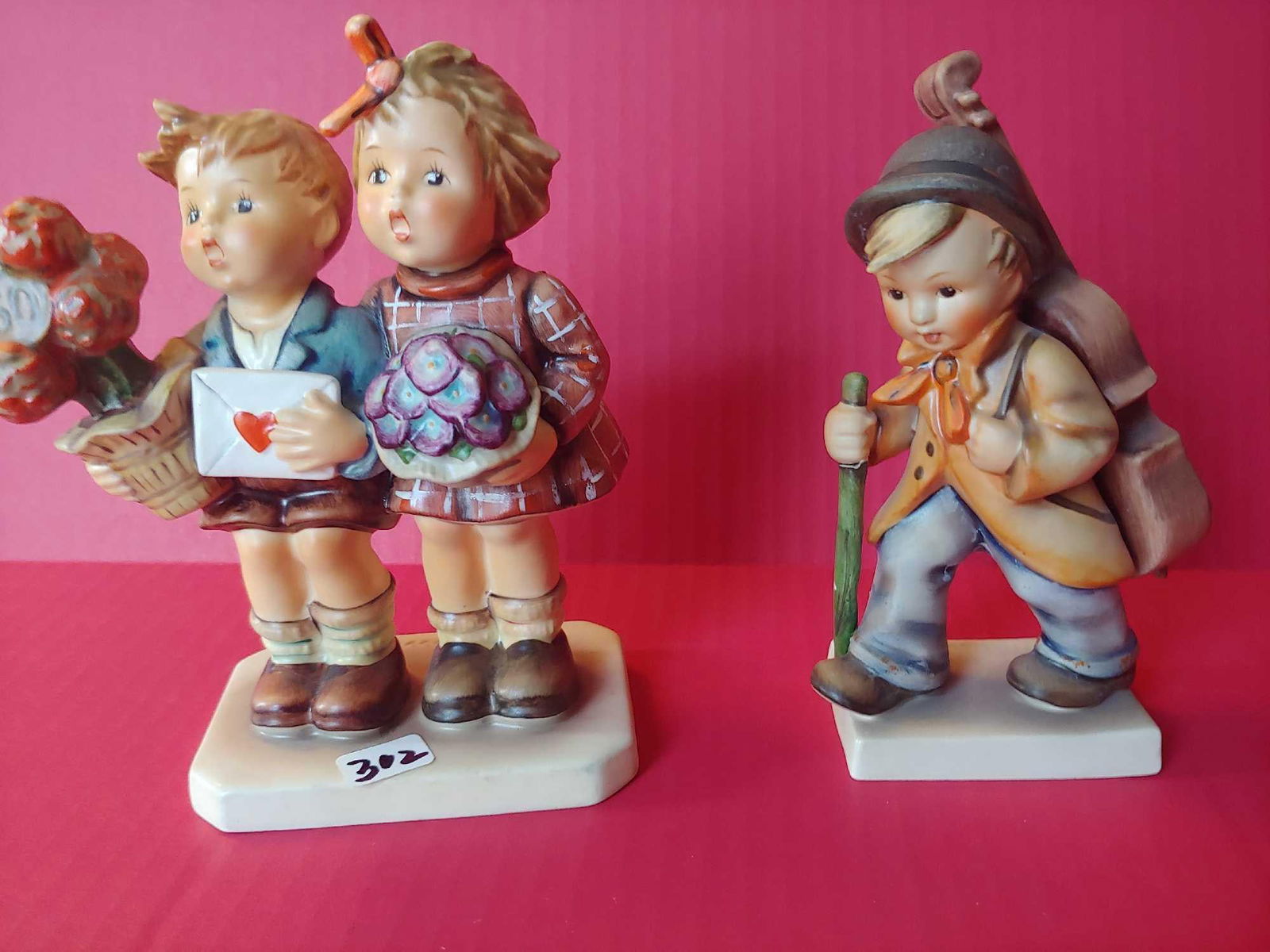GOEBEL HUMMEL FIGURINE LOT OF 2 WITH ONE SIGNED: SHOWING NO CHIPS, CRACKS OR BREAKS 6.6" H