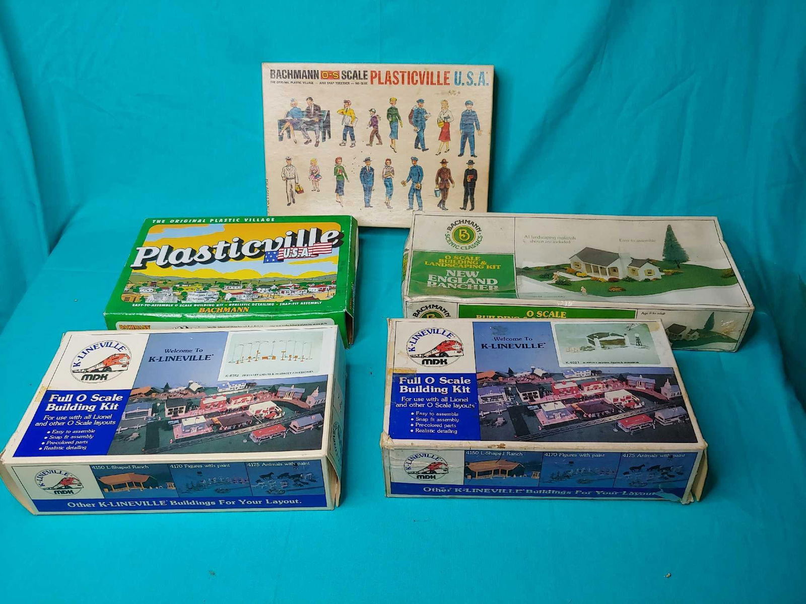 plasticville houses and k lineville houses and miscellaneous: Includes Airport with plane street lights and accessories, New England Rancher house, windmill with farm machinery and 1915 citizens