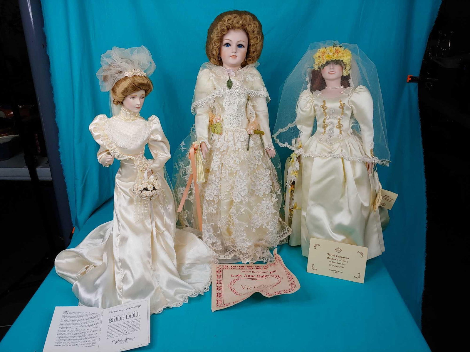 three porcelain bridal dolls: Includes Sarah Duchess of York, Victoria, and the Gibson Girl Bridal doll