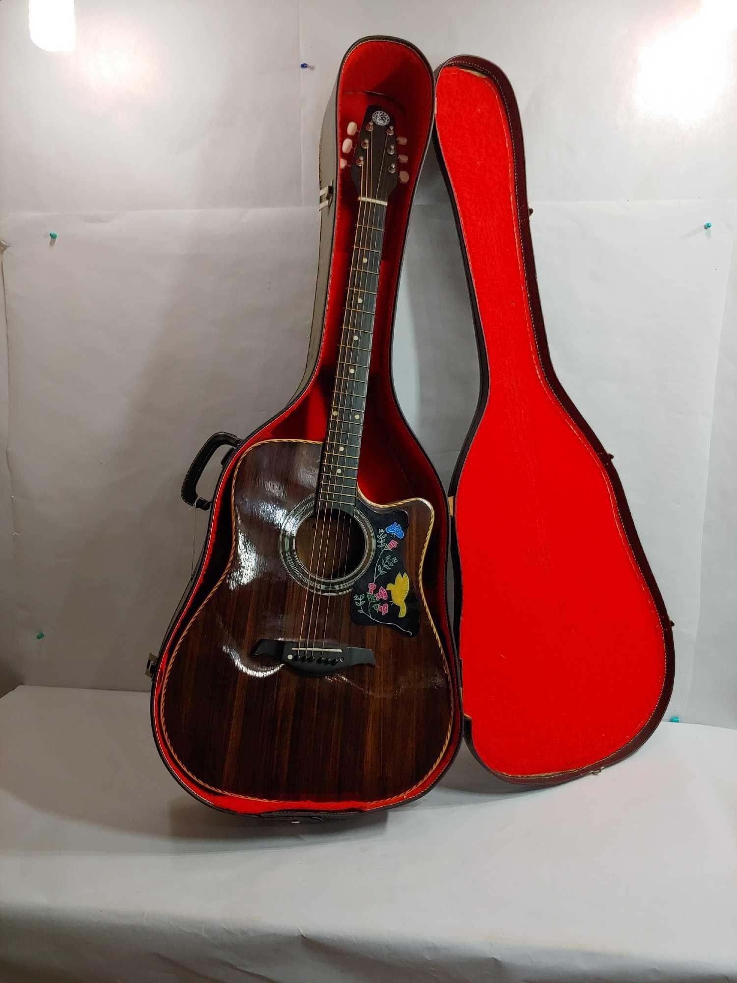 LUMANOG LMS ACOUTSTIC 6 STRING GUITAR WITH FLORAL INLAY IN CARRYING CASE: NEAR MINT CONDITION GUITAR WITH ALL PARTS FULLY INTACT APPEARS 2 STRINGS HAVE BEEN REPLACED 41 IN