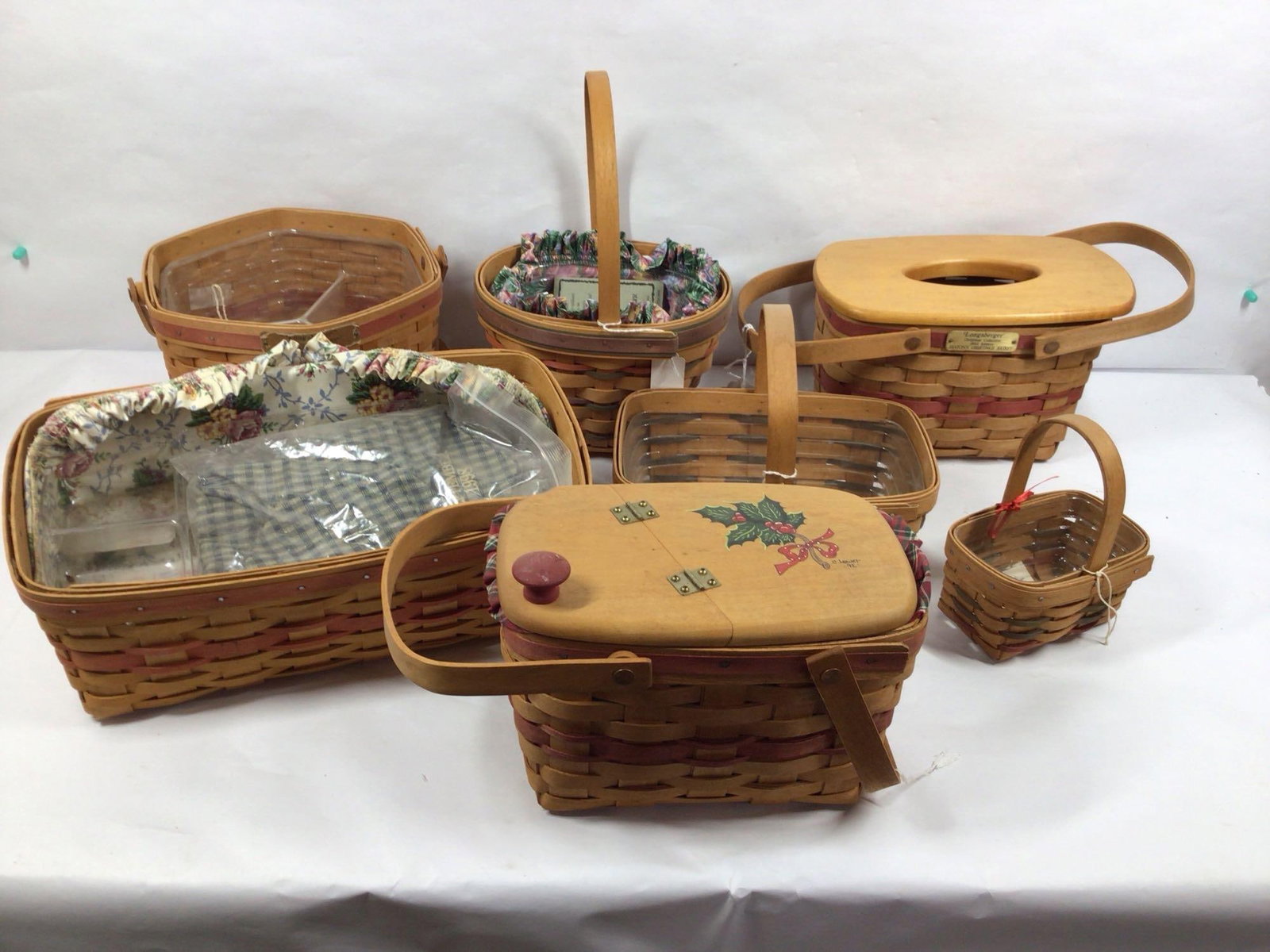 7 LONGENBERGER BASKETS: ALL ARE MARKED ON BOTTOM, SOME INCLUDE LINERS