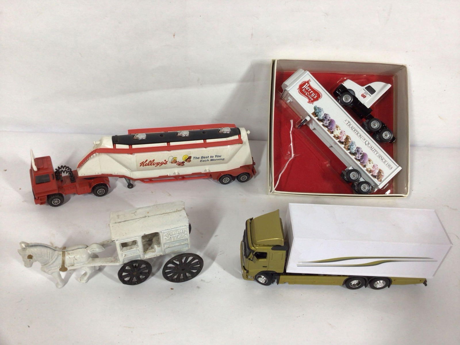 WINROSS, KELLOGGS AND CAST IRON MILK CART: WINROSS PERRYS ICE CREAM SEMI, ALL ARE IN GOOD CONDITION.