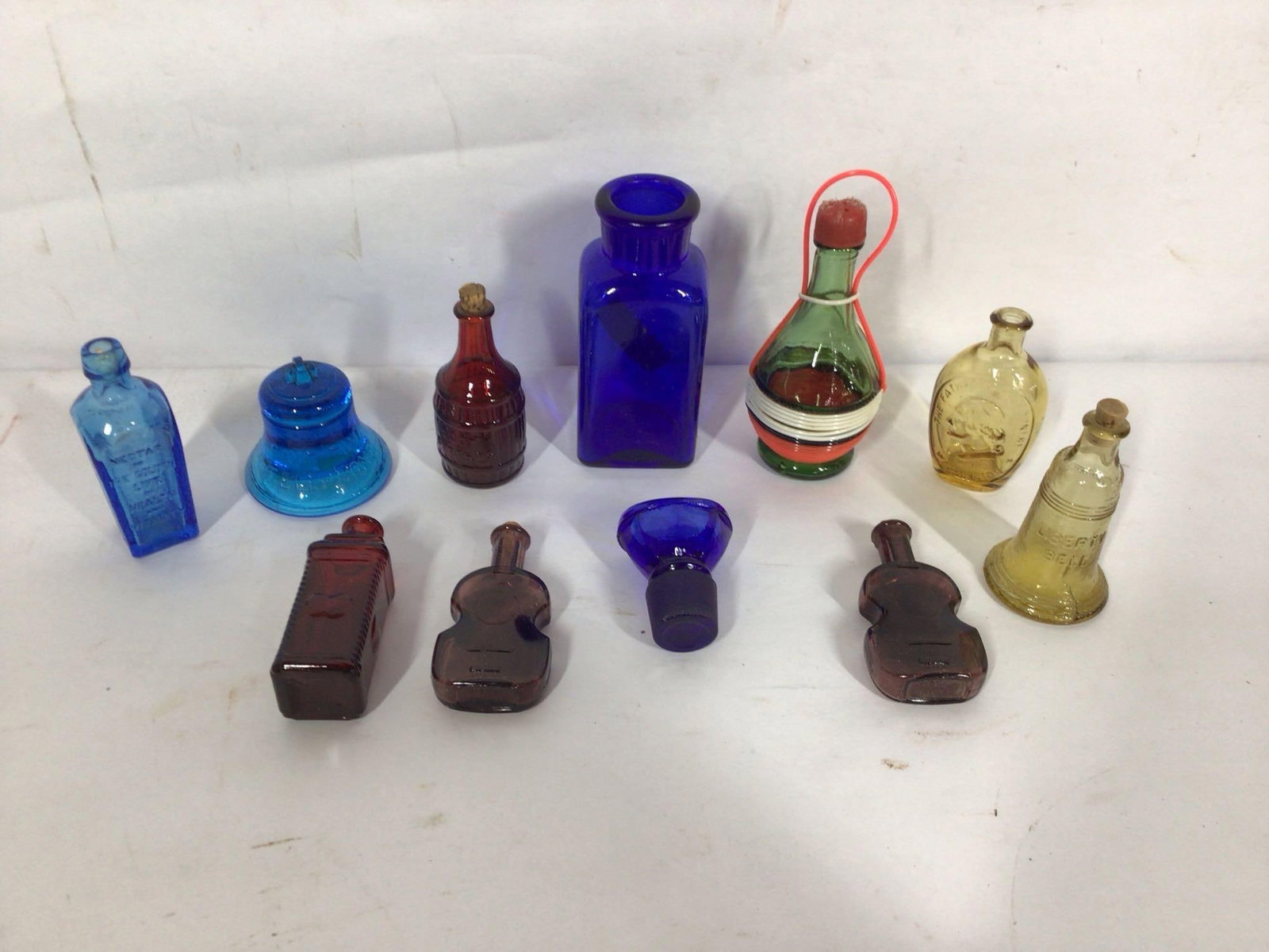 LOT OF 11 VARIOUS MINIATURE BOTTLES: INC. COBALT BLUE, AMBER AND MORE AS SHOWN IN PHOTOS WITH NO CHIPS, CRACKS OR BREAKS