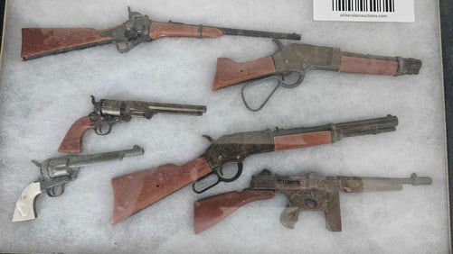 MINIATURE RIFLES, PISTOLS, AND MACHINE GUNS
