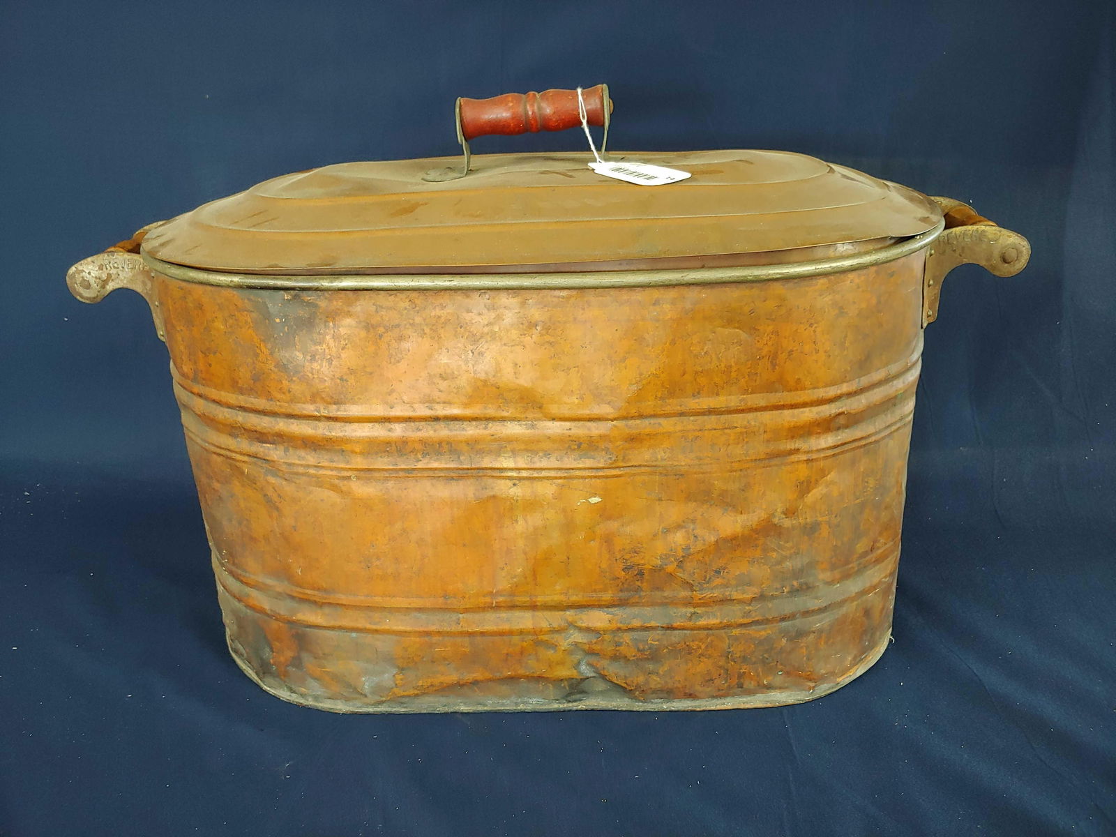 COPPER BOILER: WOOD HANDLES AND LID. SHOWS SEVERAL MINOR DENTS. 28X13X15