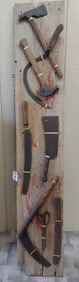 CLEAVER, SICKLE, HAMMERS, AND TOOL MOUNTED BOARD