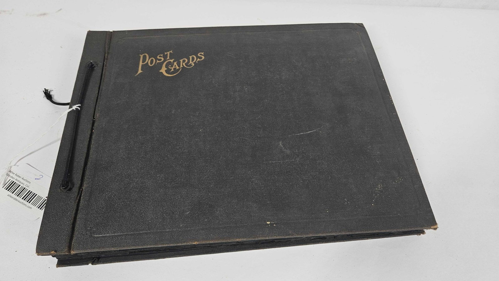 Album of early postcards: Album is 10in x 13in.