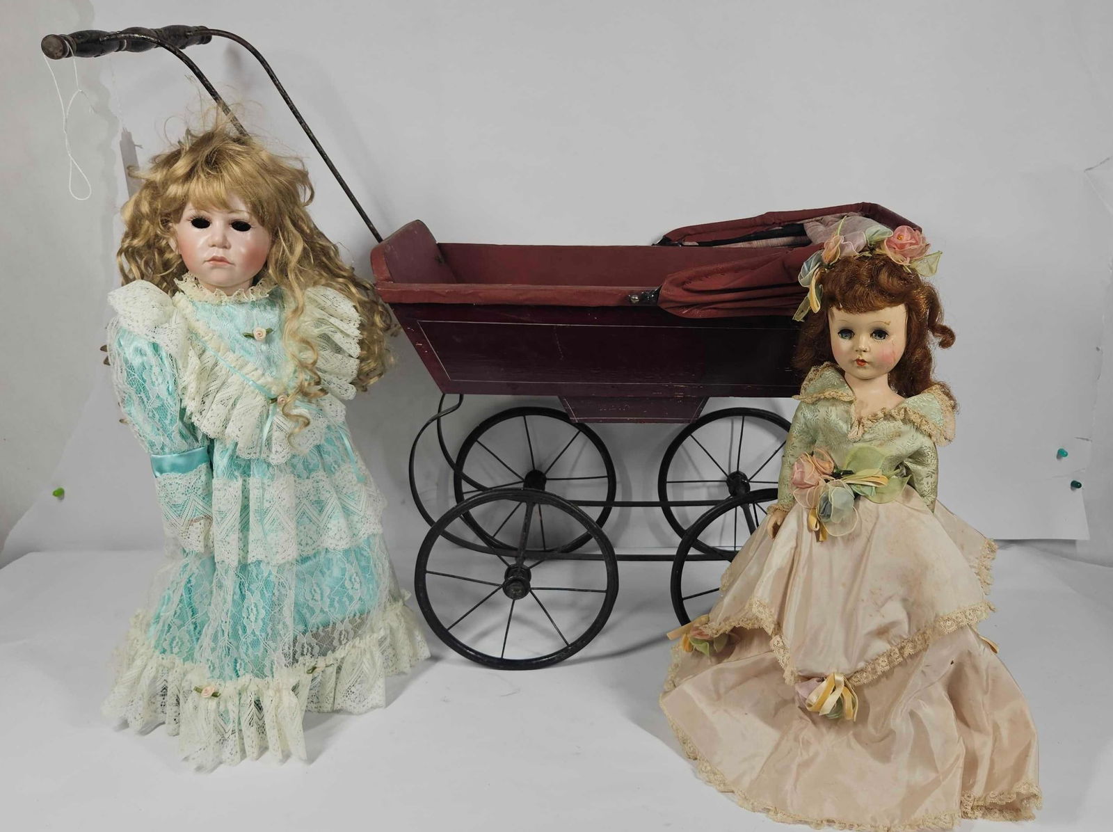 EARLY WROUGHT IRON BABY BUGGY AND DOLLS (1 of 8)