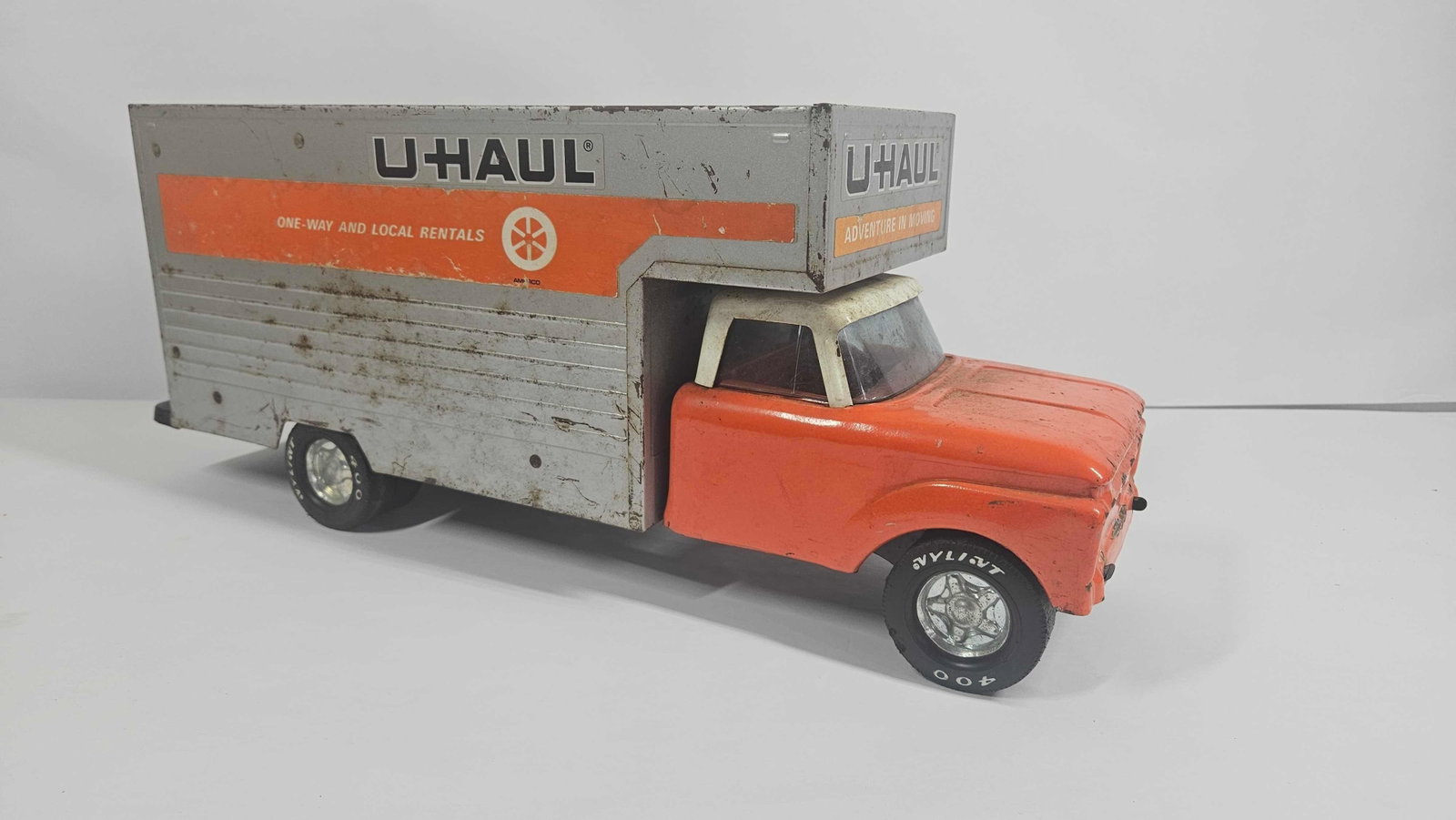 NYLINT U HAUL TRUCK: SOME MINOR SPOTTING TO TOP OF THIS TRUCK. 18X7.5 X 6