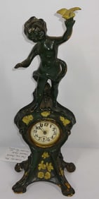 Victorian era cast iron Cherub mantle clock