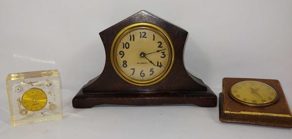 Gilbert, New Haven clocks & exploded Millionaire Lucite cube