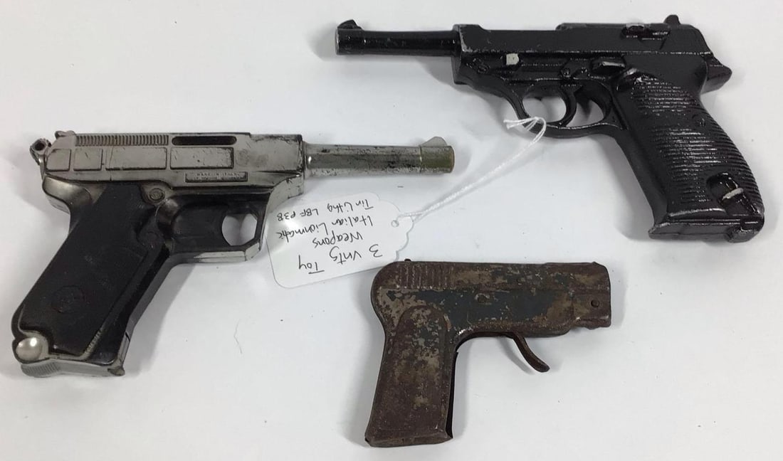 3- Toy handguns: Larger one is a cast replica, also a Lion Matic and small tin litho.