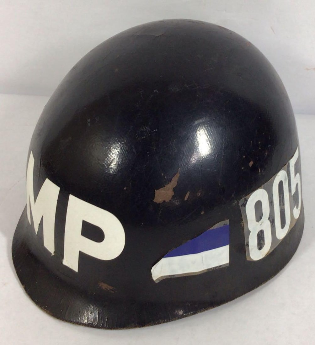 Vintage Military Police M1 Helmet: includes liner. Some paint peeling from outside