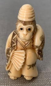 Hand Carved Monkey in Robes Japanese Netsuke