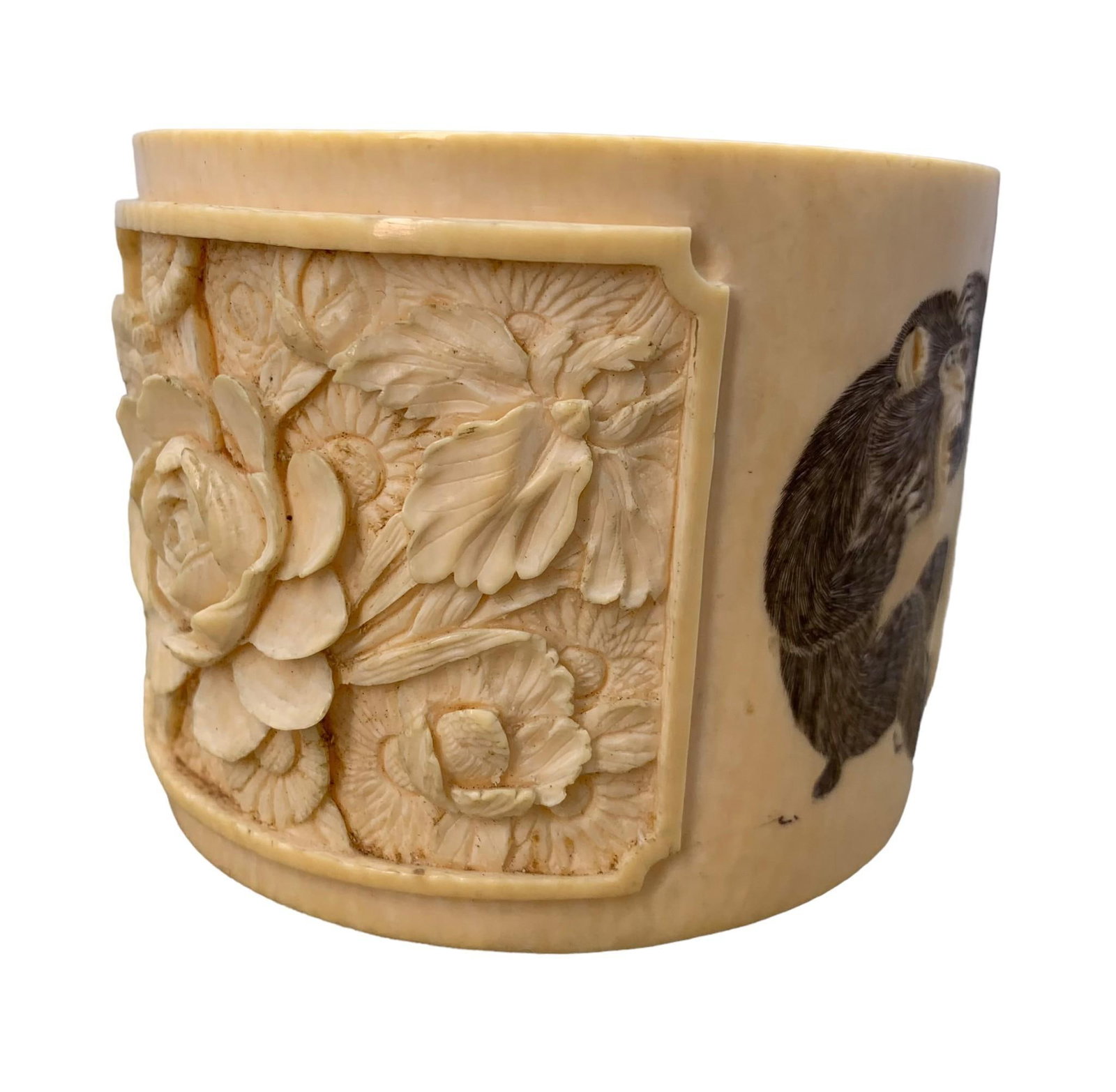 Incredible Hand Carved Floral Panel Monkey Scrimshaw Cuff: 2 1/2" hand carved natural material cuff with high relief bracketed floral panels and detailed monkey scrimshaw.