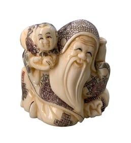 Hand Carved Japanese Boy with Sage Netsuke