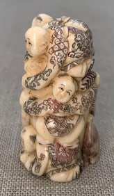 Hand Carved Japanese Children with Dog Netsuke