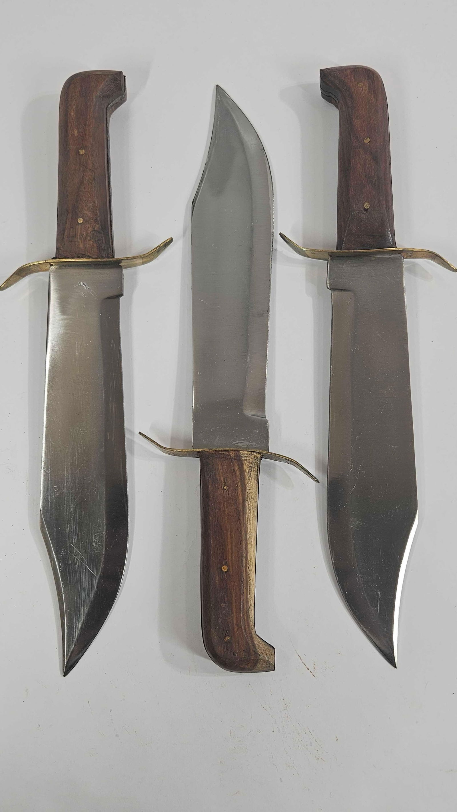 HEAVY DUTY BOWIE KNIVES: 3- EACH HAS A 10 IN BLADE WITH A 15 IN HANDLE