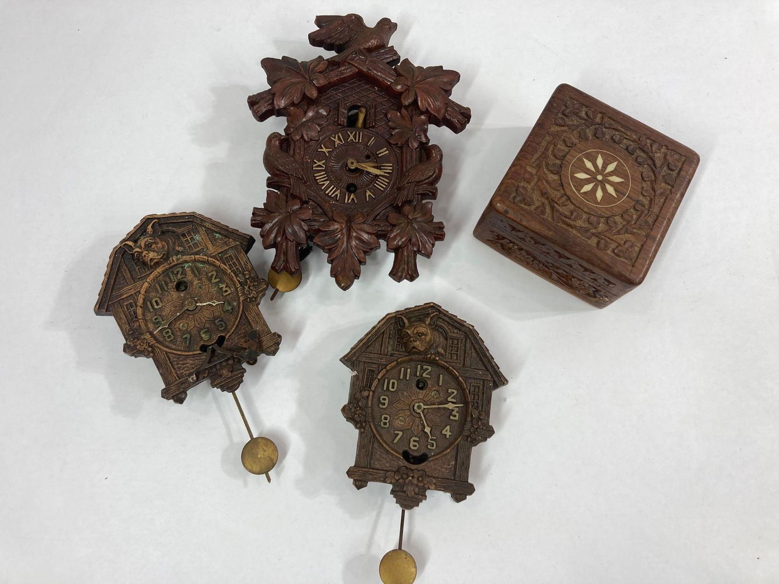 CUCKOO CLOCKS AND WOOD BOX (1 of 9)