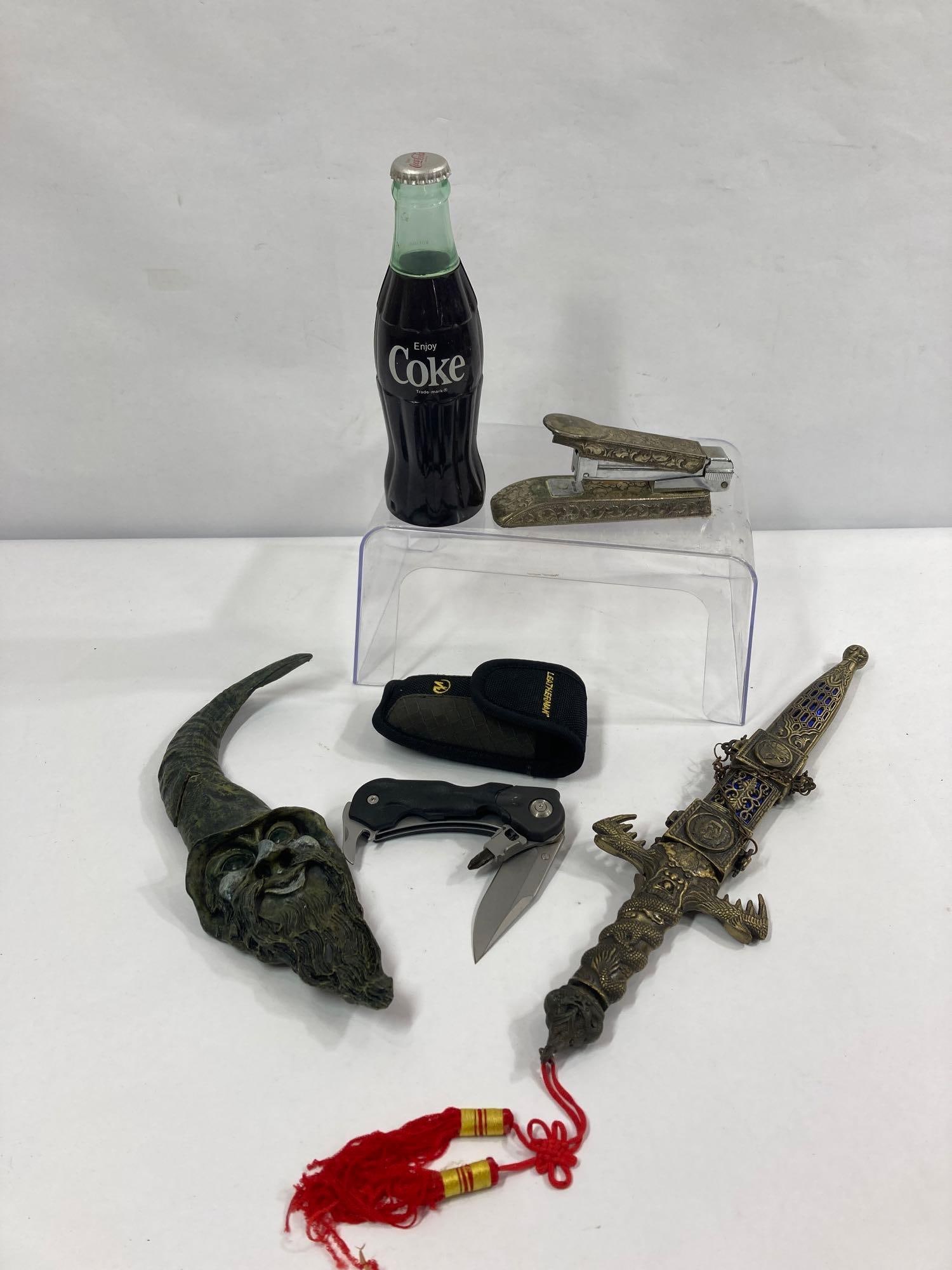 LEATHERMAN, DECORATIVE SWORD, COKE ADVERTISING AND MORE: ORNATE STAPLER, GNOME DAGGER AND OTHER COOL ITEMS
