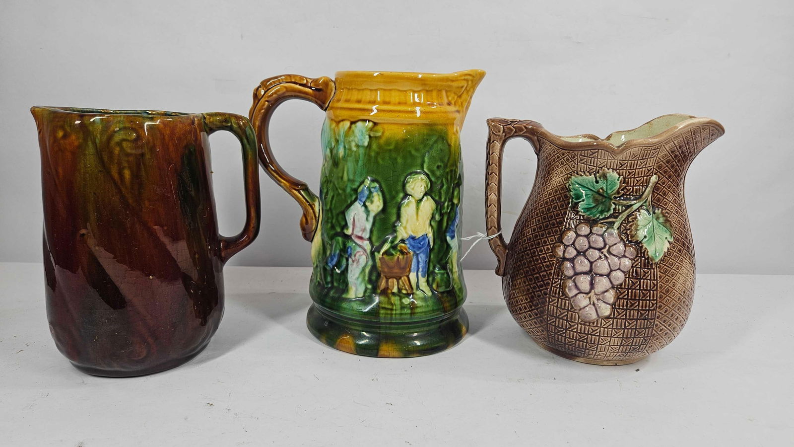 3 POTTERY PITCHERS (1 of 6)