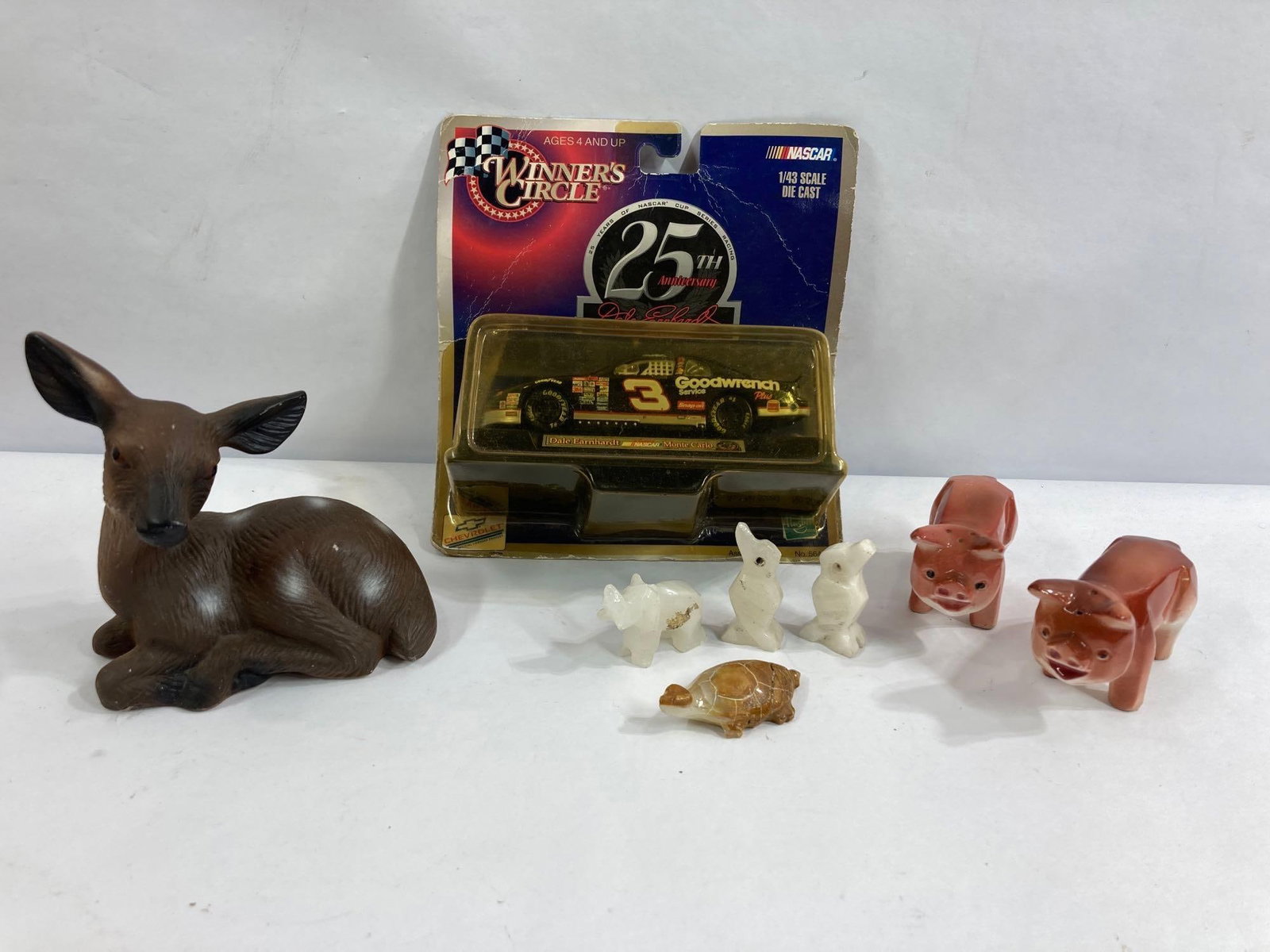 HAND CARVED ANIMALS, EARNHARDT CAR, AND MORE: 25th Anniversary NASCAR 1/43 scale. Shakers, stone carved animals and ceramic deer.
