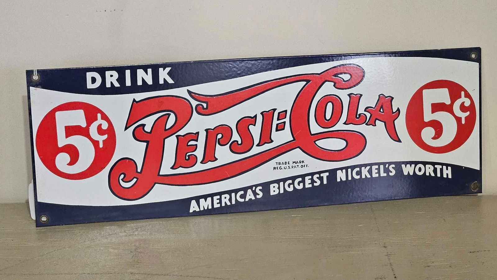 Ande Rooney porcelain Pepsi-Cola sign: 6in x 18in.
