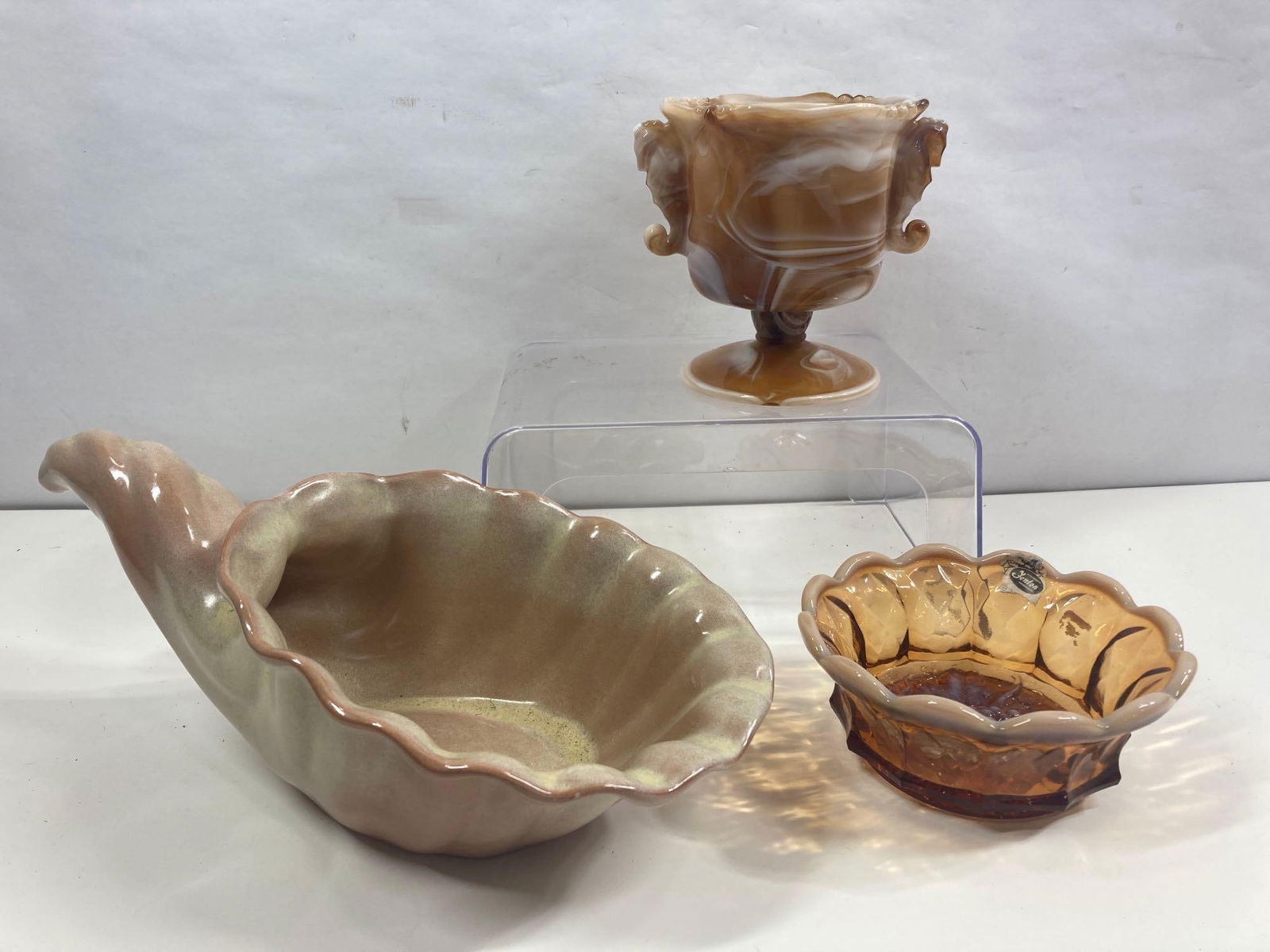FENTON, HEISEY, AND FRANKOMA GLASSWARE: FENTON GRAPE LEAF BOWL IS 5.5 IN DIAMETER, HEISEY COMPOTE WITH SEAHORSE HANDLES IS 5X5, AND FRANKOMA CORNUCOPIA IS 13 INCHES. ALL PIECES ARE IN GOOD CONDITION. NO MAJOR CHIPS OR CRACKS WERE FOUND