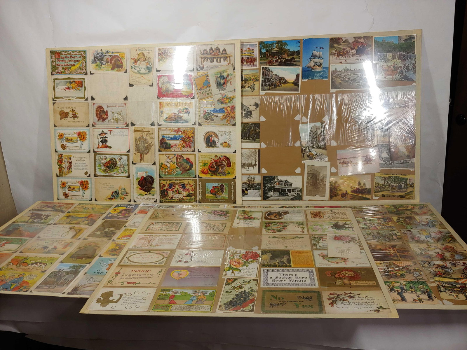 COMIC, THANKSGIVING, ANIMAL THEMED, AND MORE: MOUNTED ON BOARDS, MOSTLY 1900S. APPROX 130 CARDS