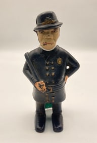 CAST IRON POLICEMAN COIN BANK