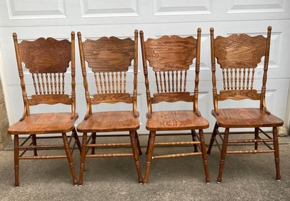 CARVED OAK DINING CHAIRS