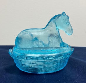 BLUE GLASS HORSE ON NEST