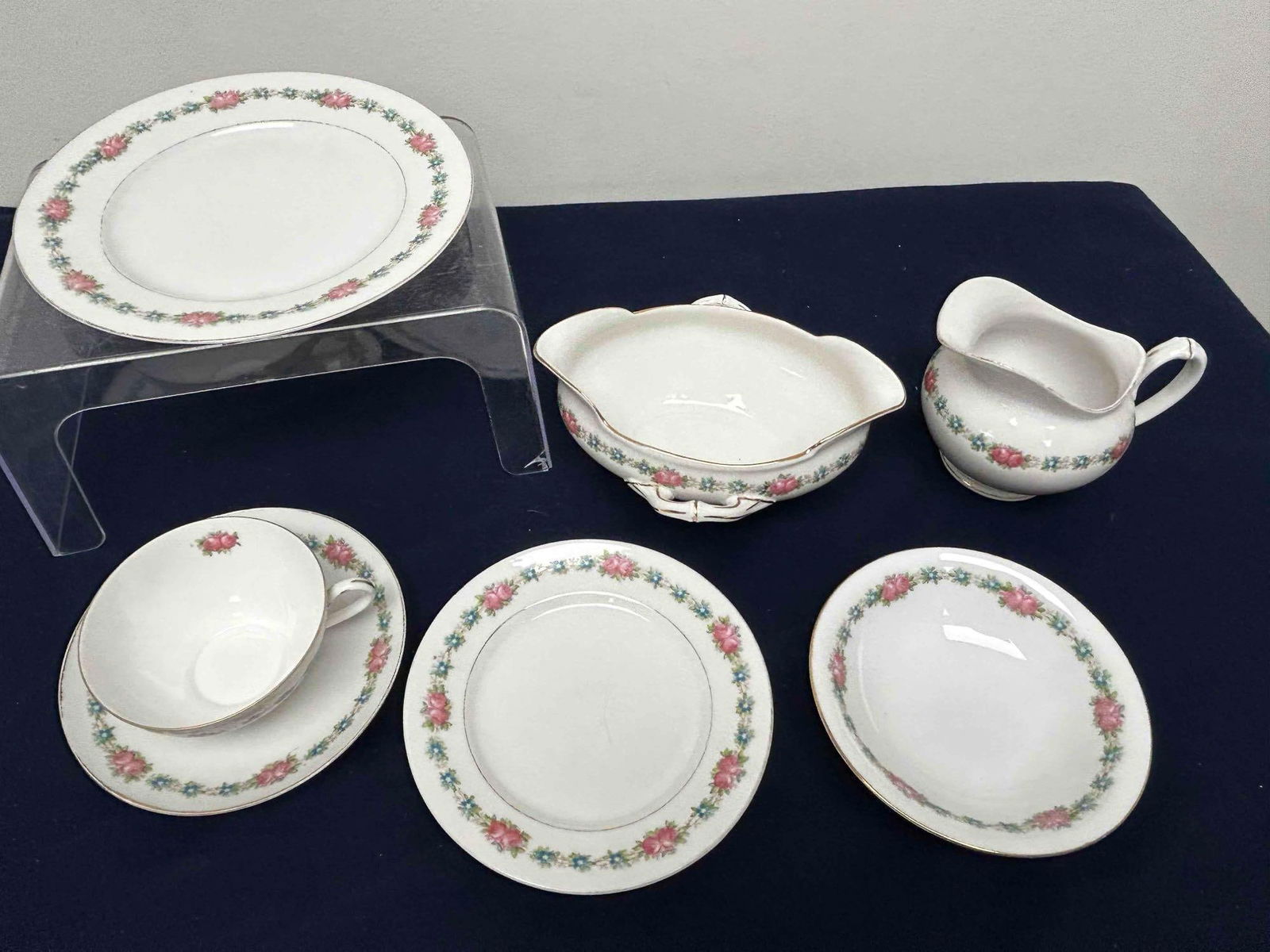 LATE 19TH CENTURY MORITZ ZDEKAUER AUSTRIA CHINA: BEAUTIFUL FLORAL PATTERN. 90+ PIECES INCLUDING 11XL PLATES, 11 LARGE, 12 MEDIUM, AND 9 SMALL. CREAMER AND SUGER, SMALL SERVING BOWL AND PLATE, 11 TEA CUPS, 17 SAUCERS, AND 18 SMALL BOWLS. MANUFACRURER