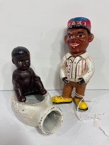 CAST IRON TAXI DRIVER AND BOY ON POST BANKS